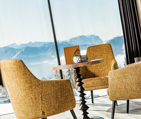 Table with a view on the Dolomites